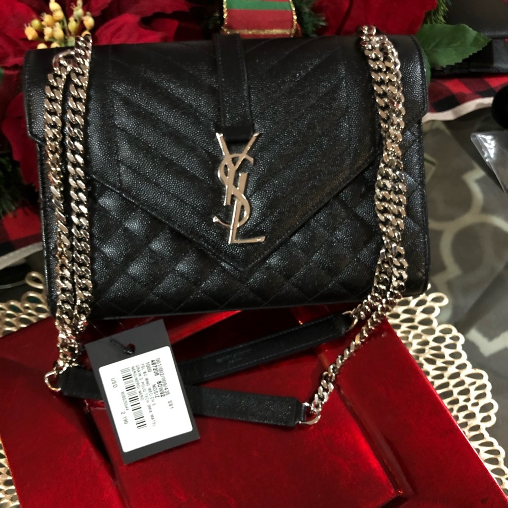 100% Authentic YSL black quilted purse